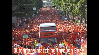 Dutch fans marching through Basel [upl. by Haggi]